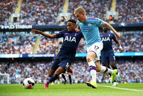 Walker-Peters with a tackle vs Manchester City at Etihad Stadium in the Premier League