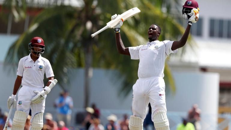 Jason Holder celebrating after hitting his maiden double century in Test cricket