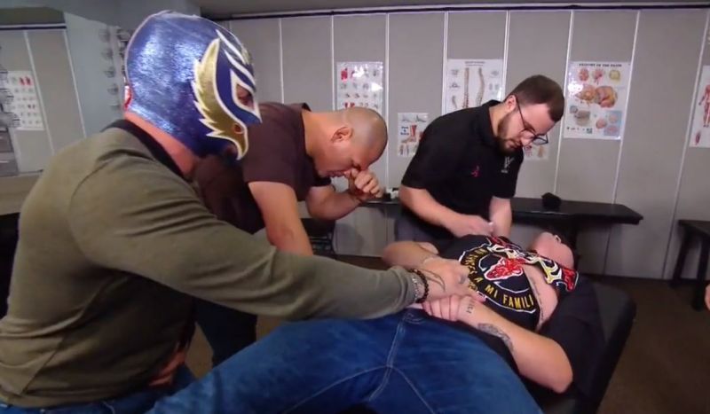 Rey Mysterio and Cain Velasquez with Mysterio&#039;s son Dominick