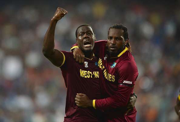 Carlos Brathwaite with Chris Gayle