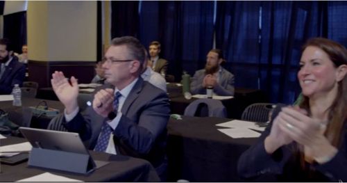 Daniel Bryan, Michael Cole and Stephanie McMahon at the SmackDown production meeting.