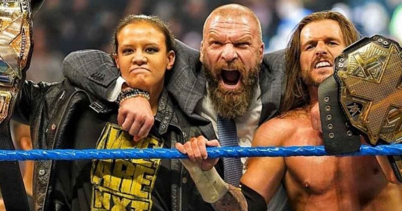 Shayna Baszler, Triple H and Adam Cole.