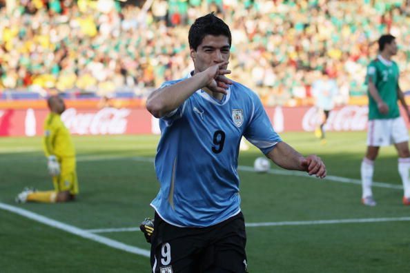 Suarez celebrates his goals in his unique style