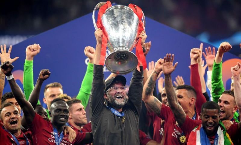Liverpool celebrate their 2018-19 UEFA Champions League title Real Madrid celebrate their La Decima in 2014