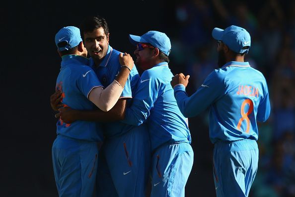 Ravichandran Ashwin celebrates a wicket with teammates
