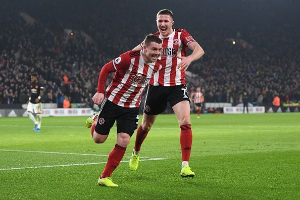 John Fleck celebrates his first-half goal