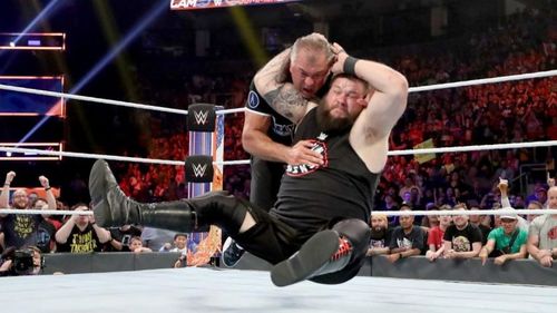 Owens hitting Shane McMahon with a Stunner