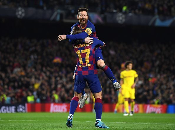 Lionel Messi celebrates with his teammate