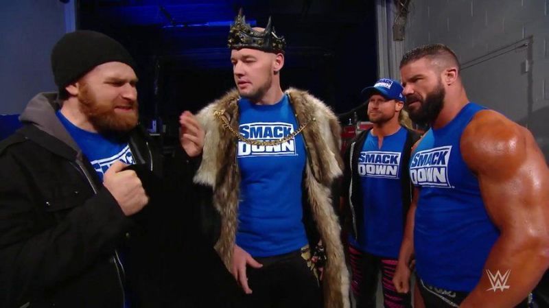 Sami Zayn talking to the SmackDown team backstage