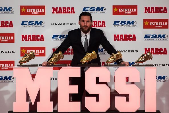 Lionel Messi receiving Golden Shoe award