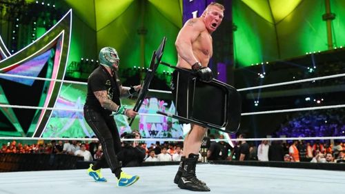 Rey Mysterio assaults Brock Lesnar