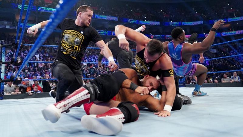 The Undisputed Era beating down The Revival and The New Day