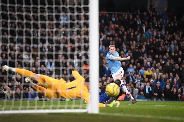 Kevin De Bruyne whips his shot past the Chelsea defence