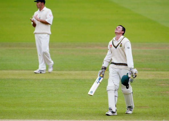 Graeme Smith of South Africa celebrates getting his double century as Nasser Hussain of England applauds