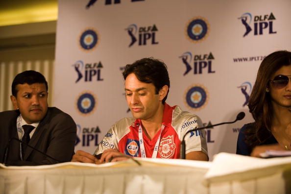 Ness Wadia (centre).