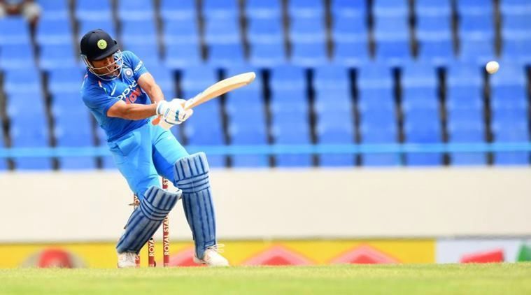 MS Dhoni's playing his trademark Helicopter shot