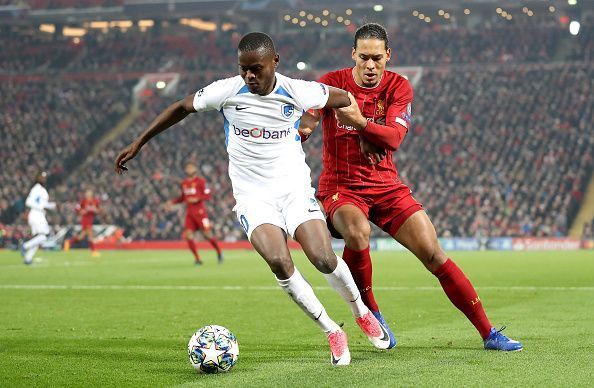 Mbwana Samatta (L) tussles with Virgil van Dijk (R)