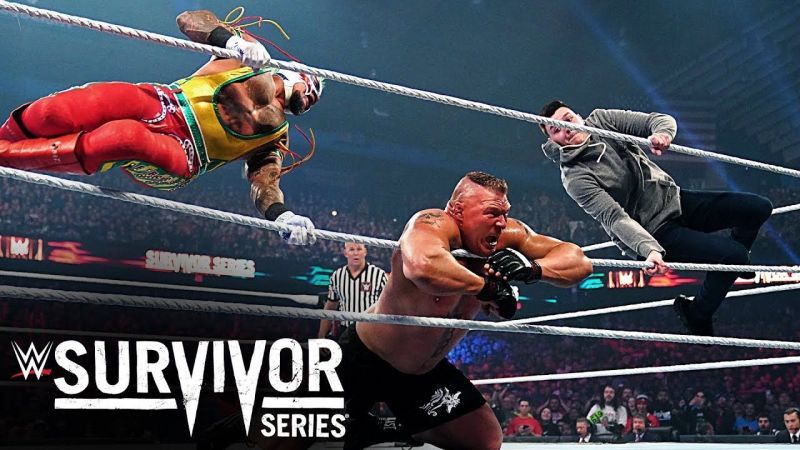 Rey Mysterio and his son Dominic hitting Brock Lesnar with a double 619