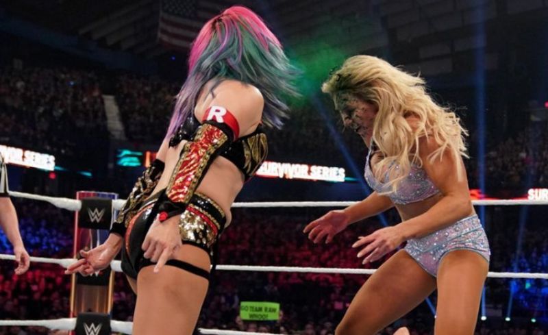 Asuka sprays the green mist on Charlotte