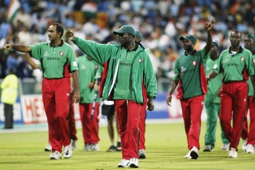 Steve Tikolo, captain of Kenya leads his players on a lap of honour.