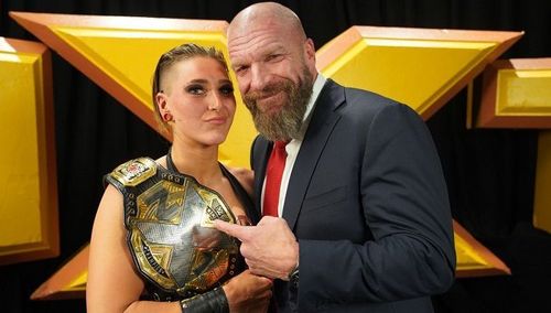 Rhea Ripley with Triple H