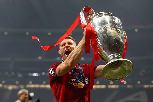 Milner lifting his first Champions League trophy