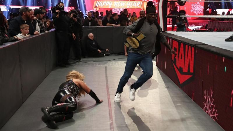 R-Truth interrupted the match and was chased around the ring