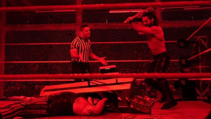 Seth Rollins punishes Bray Wyatt, AKA The Fiend, at the main event of Hell in a Cell 2019.