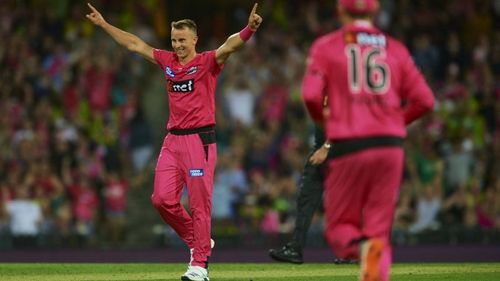 Tom Curran celebrates the Sydney Sixers' win