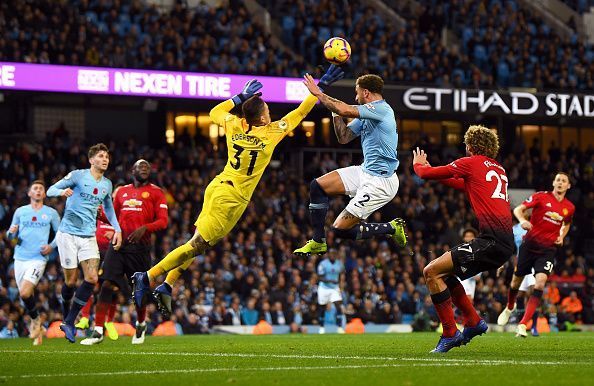 Ederson makes a flying save in the Manchester City v Manchester United tussle