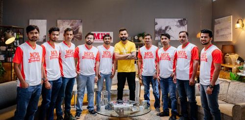 Virat Kohli with the contest winners