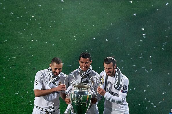 Benzema, Ronaldo and Bale with the Champions League trophy