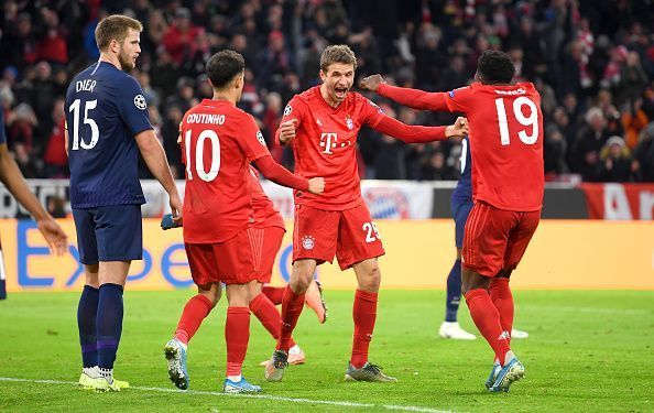 Bayern players celebrate during their 3-1 win over Tottenham, completing their 100% group stage record