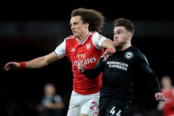 Arsenal&#039;s Luiz in an aerial tussle against Brighton &amp; Hove Albion