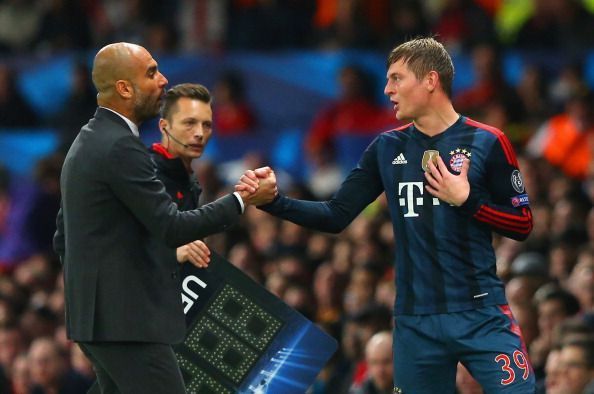 Pep Guardiola and Toni Kroos