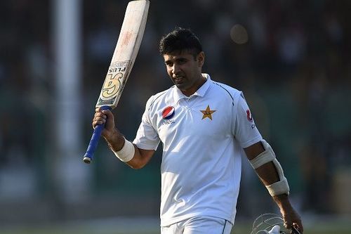 Pakistan's Abid Ali acknowledges the crowd as he walks back to pavilion after his dismissal for 174 runs