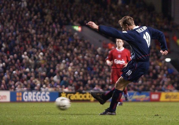 Dennis Bergkamp of Arsenal scores the second goal