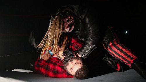 The Fiend attacks Mick Foley