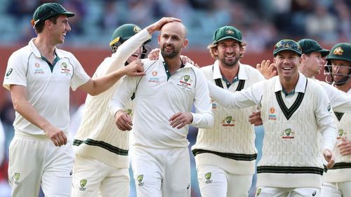 Australia celebrate one of Nathan Lyon's five wickets in the second innings