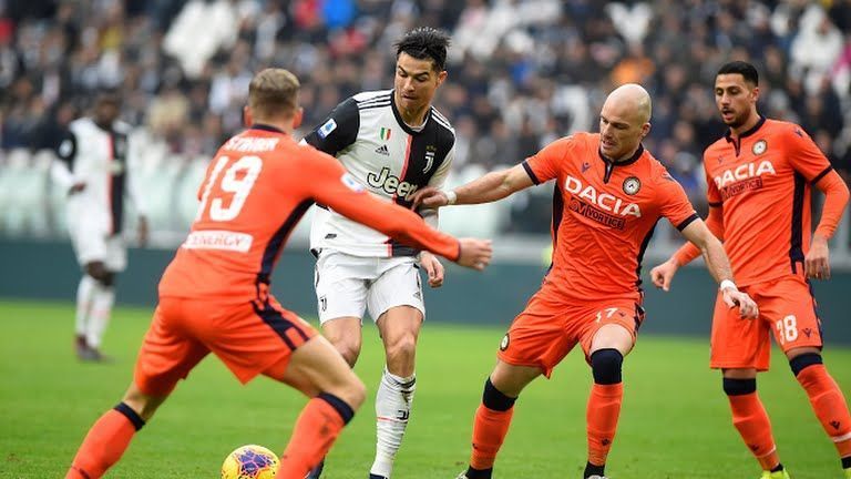 Udinese try to stop Ronaldo