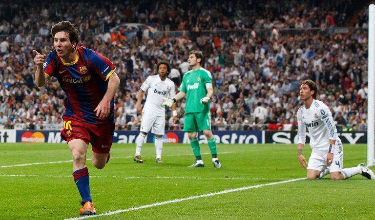 Lionel Messi celebrates after scoring against Real Madrid L