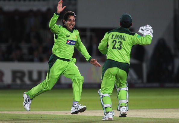 Saeed Ajmal celebrating a scwith Kamran Akmal 