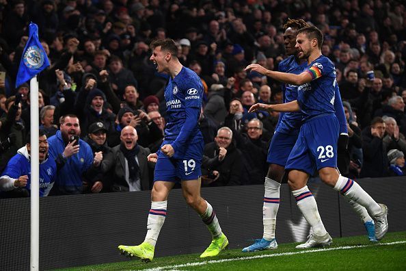 Cesar Azpilicueta and Tammy Abraham (R) celebrate as Mount scores for Chelsea against Aston Villa