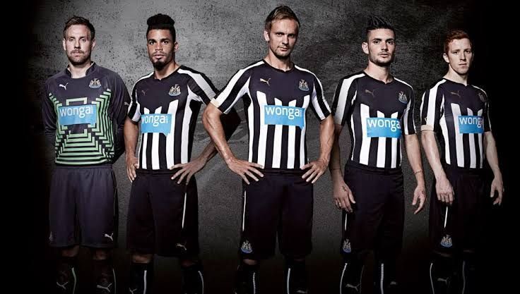 The Magpies posing for a shot in their 2014-15 home kit.