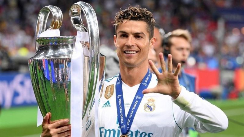 Cristiano Ronaldo poses with his 5th Champions League title