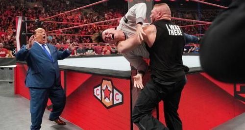 Lesnar is captured attacking Dominik