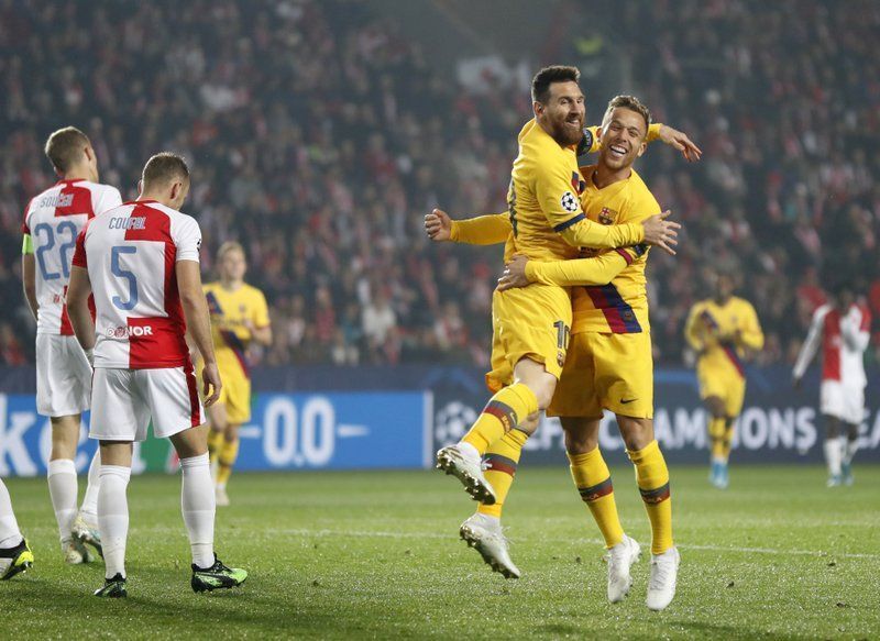 Lionel Messi rejoices after scoring against Slavia Praha