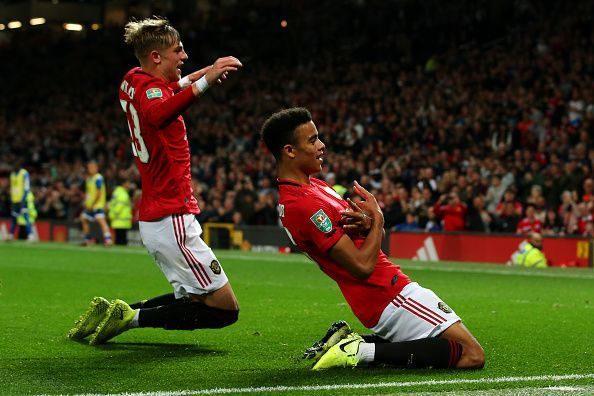 Brandon Williams (L) and Mason Greenwood (R) celebrate