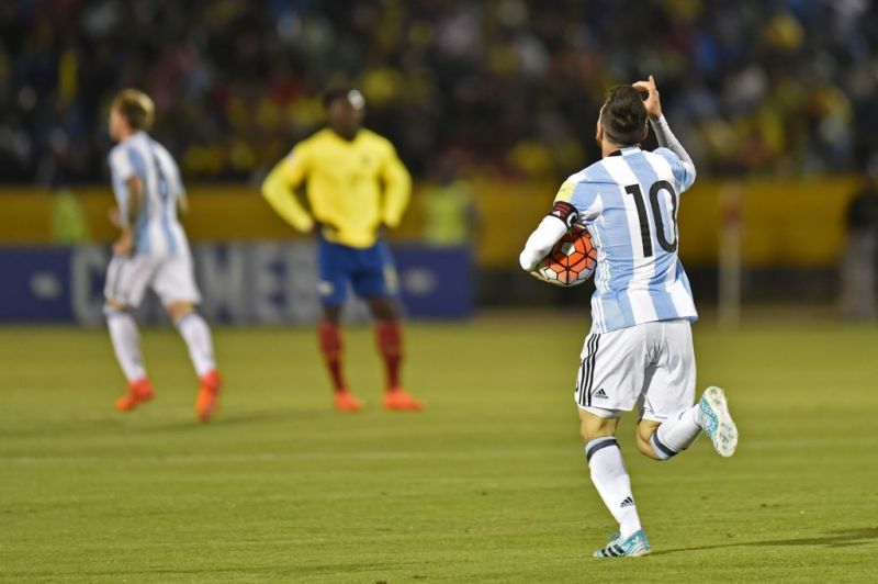 Messi claims the match ball after scoring his 2nd competitive Argentina hat-trick
