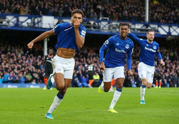 Everton players celebrate scoring against Chelsea